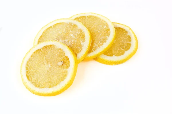 Fette di limone su fondo bianco — Foto Stock