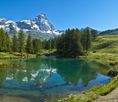 Blue lake and Mount Cervino clipart