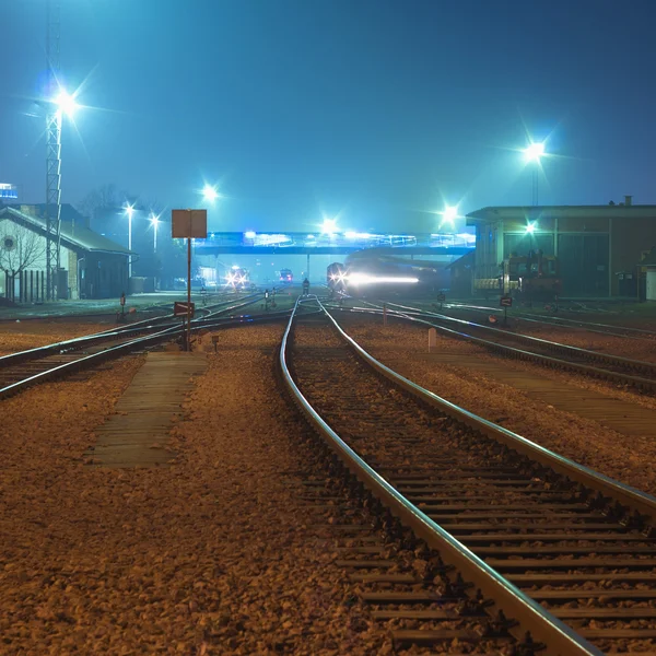 Railway tracks at night — Stock Photo, Image