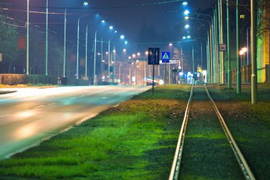 Empty street at night clipart