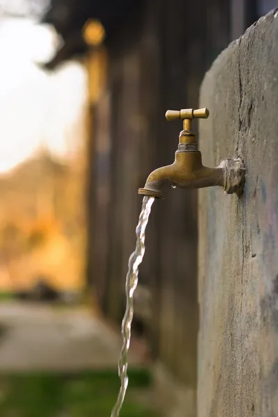 Old rusty water tap in garden — Stock Photo, Image