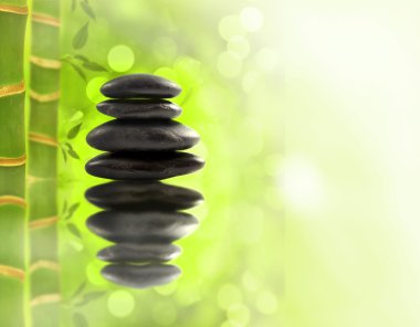 Spa stones in bamboo forest clipart