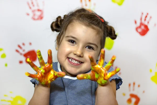 Kid playing with paint — Stock Photo, Image