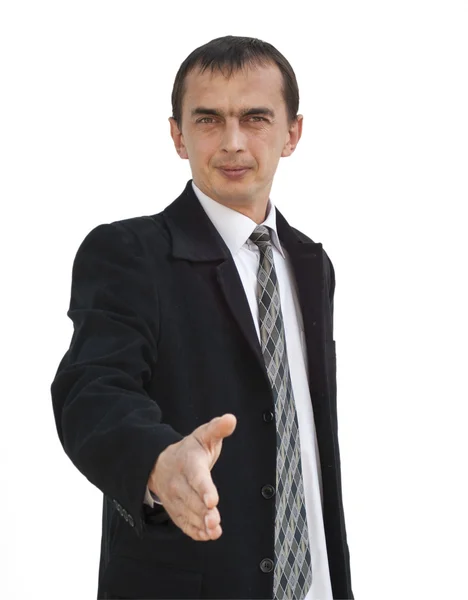 Homem de negócios estende a mão para um aperto de mão — Fotografia de Stock
