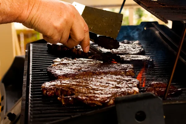 Barbequing steak — Stock Photo, Image