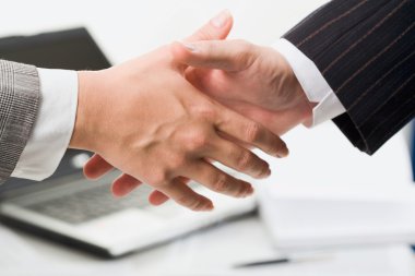 Handshake in office clipart