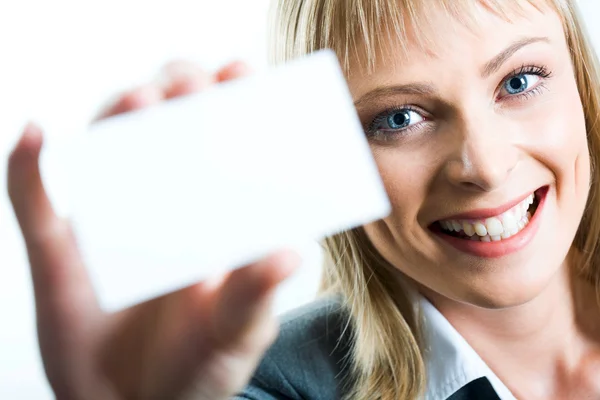 A beautiful woman holding a business card — Stock Photo, Image