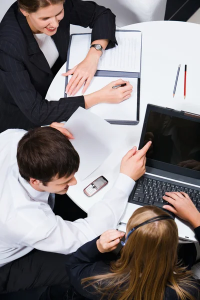 Group of business looking at monitor — Stock Photo, Image