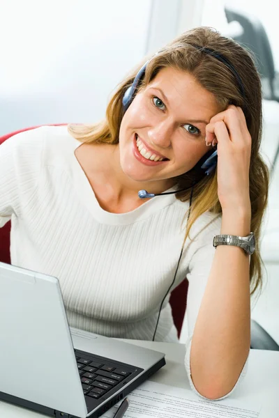Portrait of friendly smiling customer support operator — Stock Photo, Image