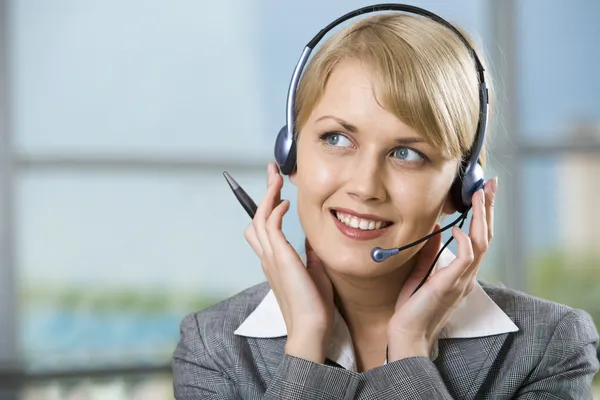 Portrait of friendly customer service representative during work — Stock Photo, Image