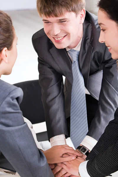 Image of business keeping their hands in pile symbolizing support and power — Stock Photo, Image