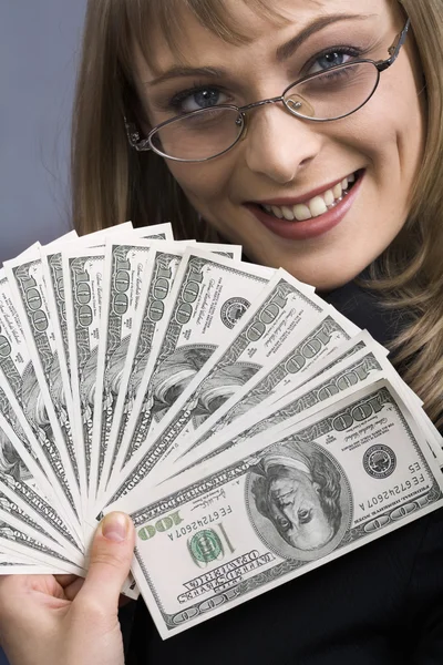 Beautiful businesswoman holding money. — Stock Photo, Image