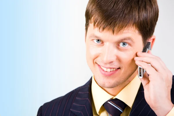 Businessman with cell — Stock Photo, Image