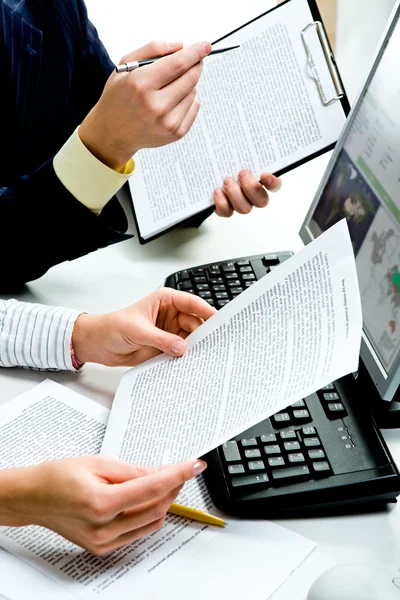 stock image Discussing documents