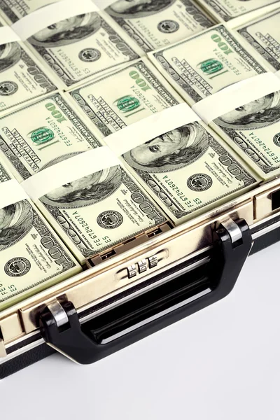 Briefcase full of dollars — Stock Photo, Image