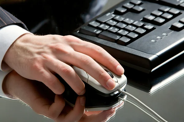 Hand on a mouse — Stock Photo, Image
