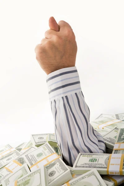 Conceptual image of male's hand showing fig out of dollar bills — Stock Photo, Image