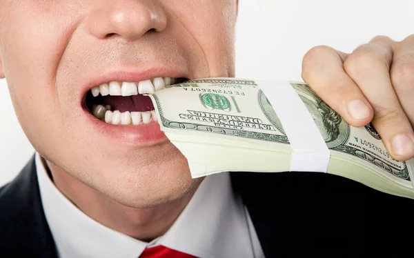 Biting money Royalty Free Stock Images