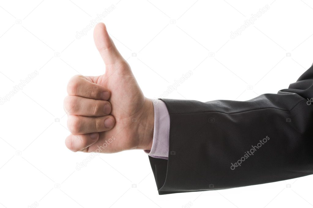 Photo of human hand showing thumb up