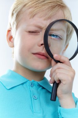 Looking through magnifying glass clipart