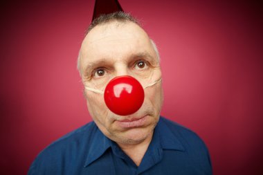 Unhappy man with red nose clipart