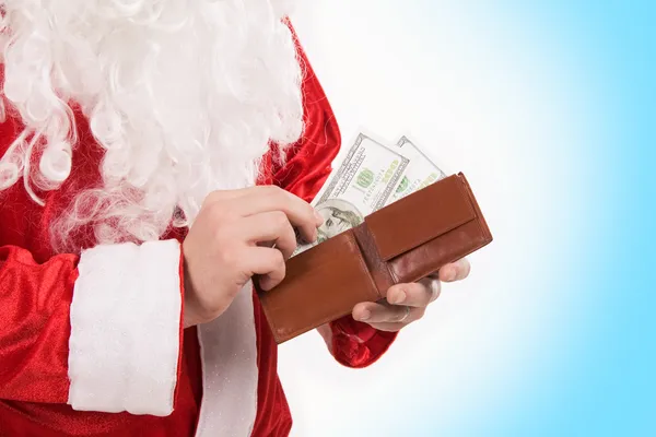 Santa's hands with wallet while counting money — Stock Photo, Image