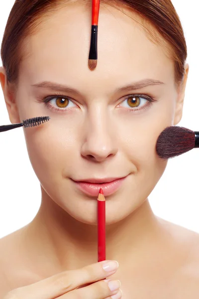 Female with makeup tools — Stock Photo, Image