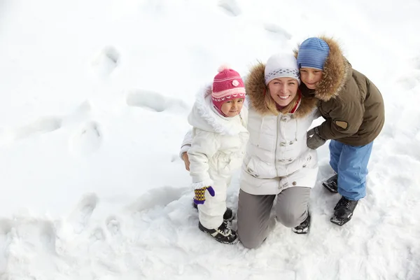 Family on snow — Stock Photo, Image