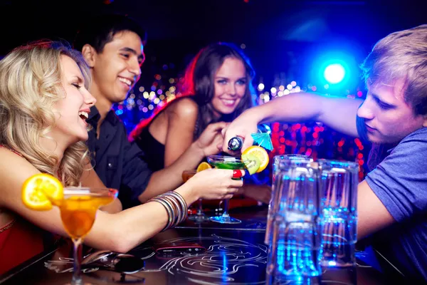 Friends in bar — Stock Photo, Image