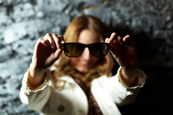 Showing sunglasses — Stock Photo, Image