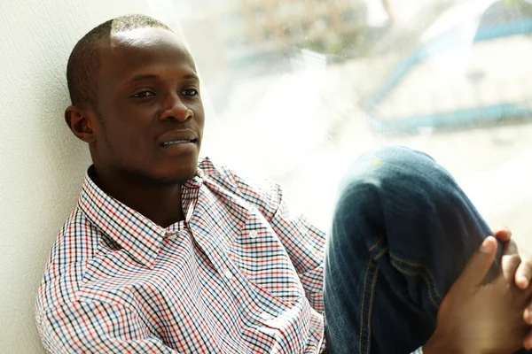 Guy by the window — Stock Photo, Image