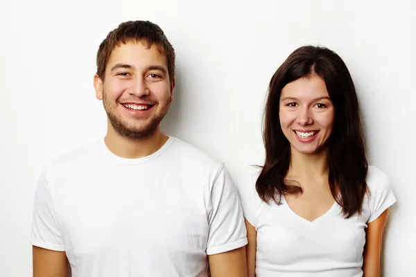 Couple in white T-shirts — Stock Photo, Image