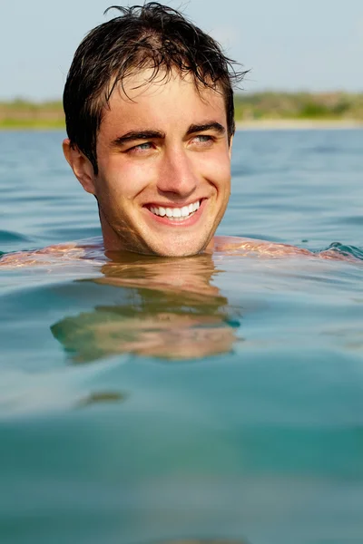 Man in water — Stockfoto