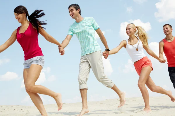 Running on beach — Stock Photo, Image