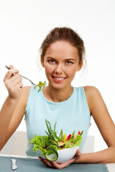 Їдять салат — стокове фото