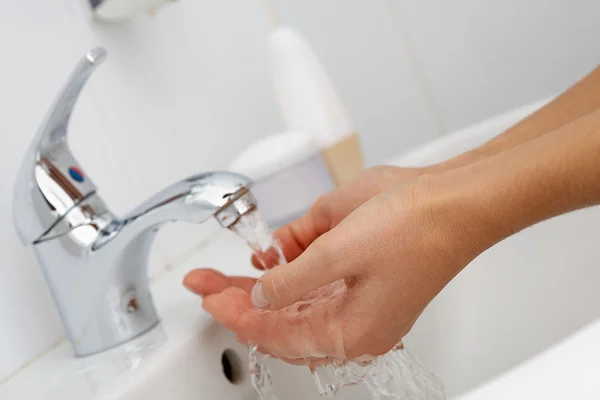Hands in water — Stock Photo, Image