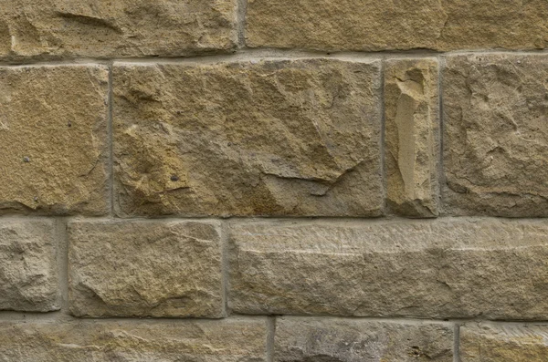 Enge Frontansicht einer Sandsteinmauer — Stockfoto