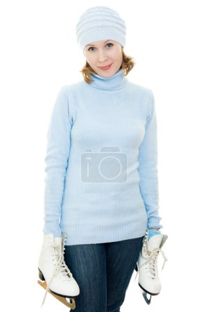 Femme avec des patins sur fond blanc .