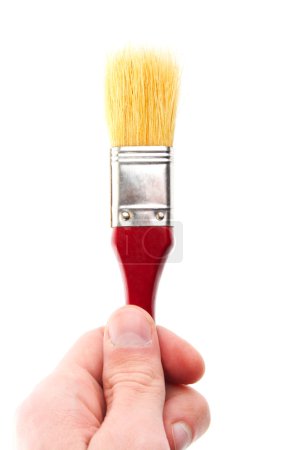 Tenez la brosse. Peintre. Isolé .