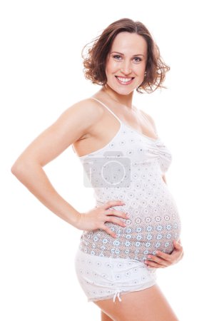 Femme enceinte étreindre son ventre 