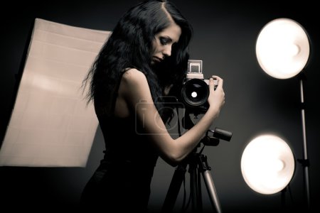 Femme photographe élégant 