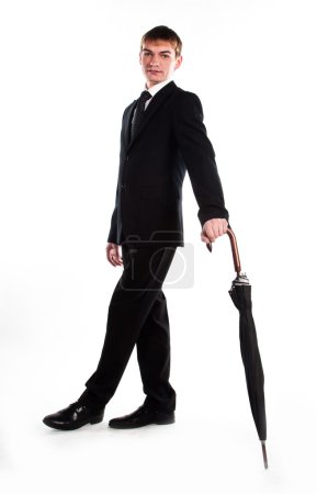 Homme d'affaires avec un parapluie 