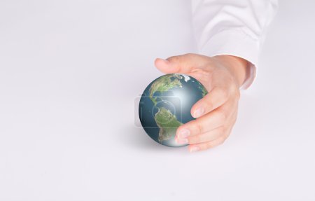 Main d'affaires tenir la Terre 
