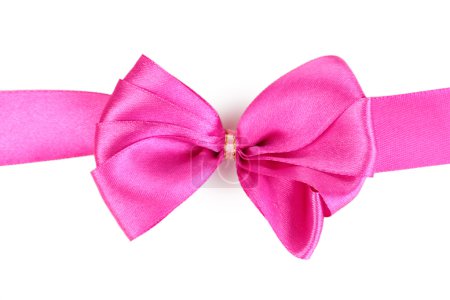 Noeud et ruban de satin rose isolés sur blanc 