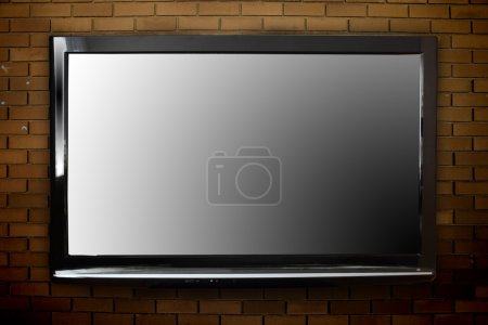 Téléviseurs plasma sur le mur 