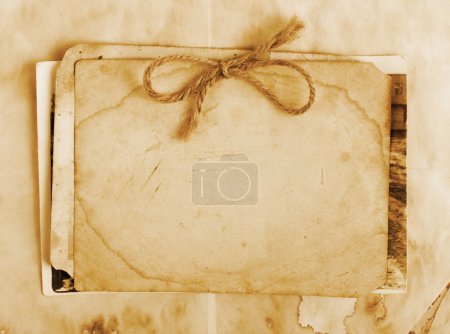 Fond vintage avec vieux papier, lettres et photos 
