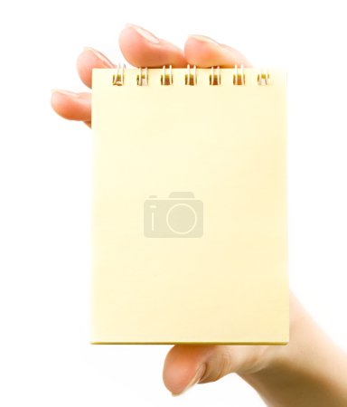 Bloc-notes dans une main 