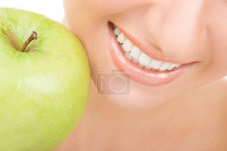 Dents saines et pomme verte 