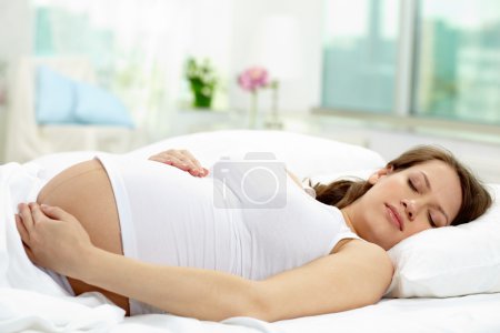Au lit.